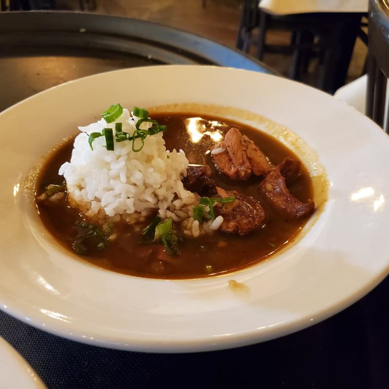 a bowl of soup sitting on a plate