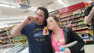 a person standing in front of a store