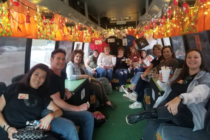 cozy tour bus sitting posing for the camera